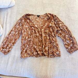 Torrid brown floral long sleeve blouse